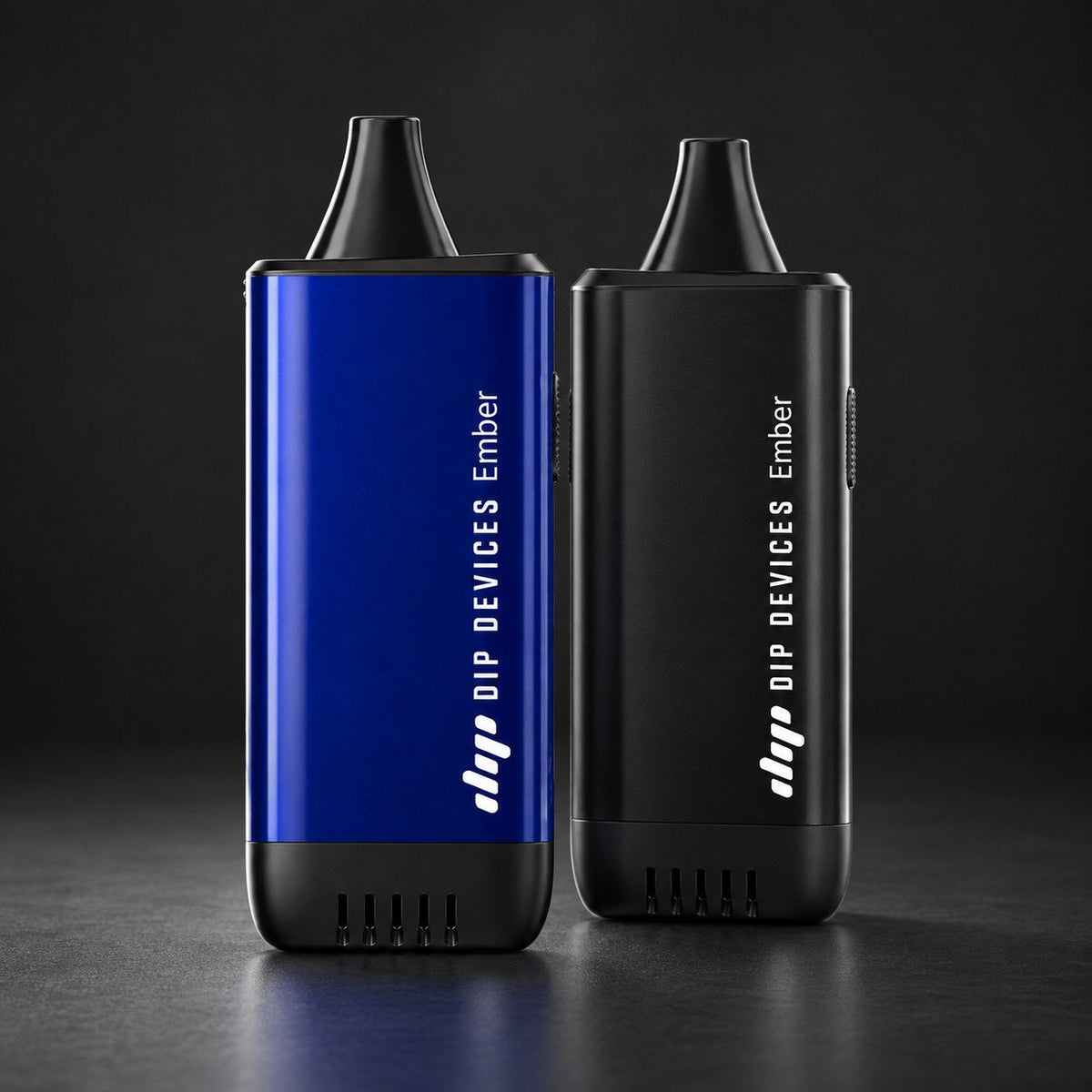 Ember electric pipe in black and blue standing side by side on a dark studio background