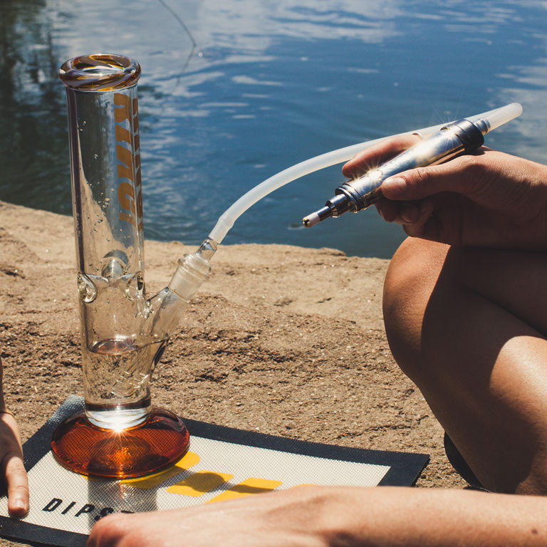 Dipwhip electric honey straw Attachment connected to Dipper lifestyle shot